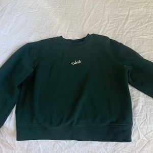 Kotn logo sweatshirt in racing green. Size Large